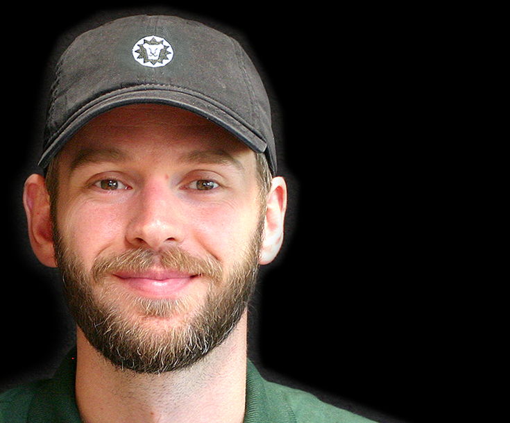 Beardsley model wearing gray baseball cap with beardsley lion logo in white